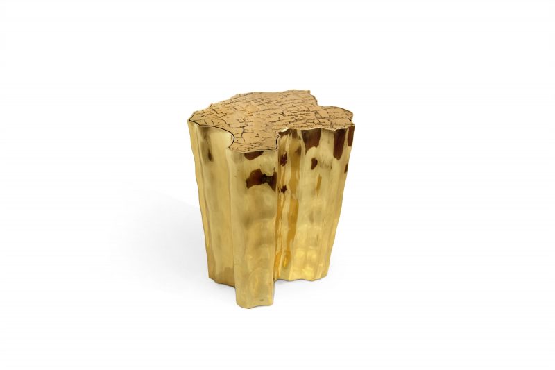 luxury villa - gold side table thar resembles a tree 