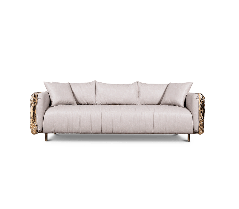 nude sofa with gold details in the back