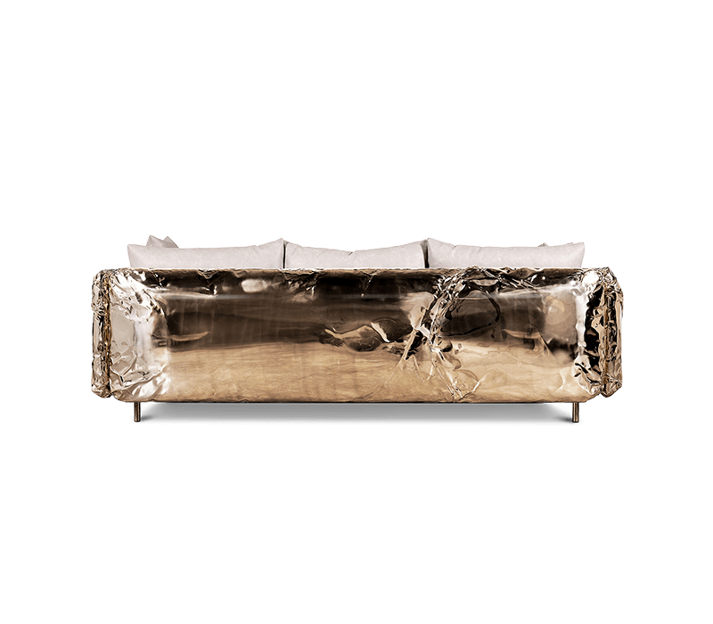 nude sofa with gold details in the back
