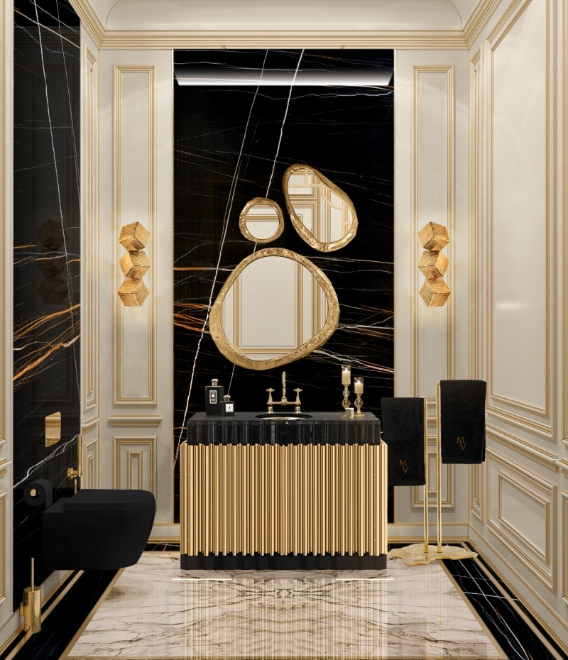 A bathroom with elegant pieces and luxurious gold details