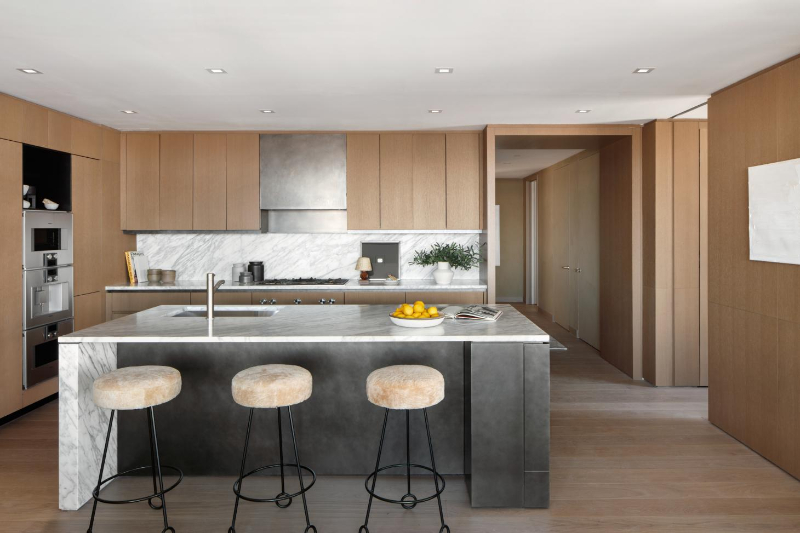 Modern kitchen with a view of New York city  at a Luxury Apartment By Cortland Interiors