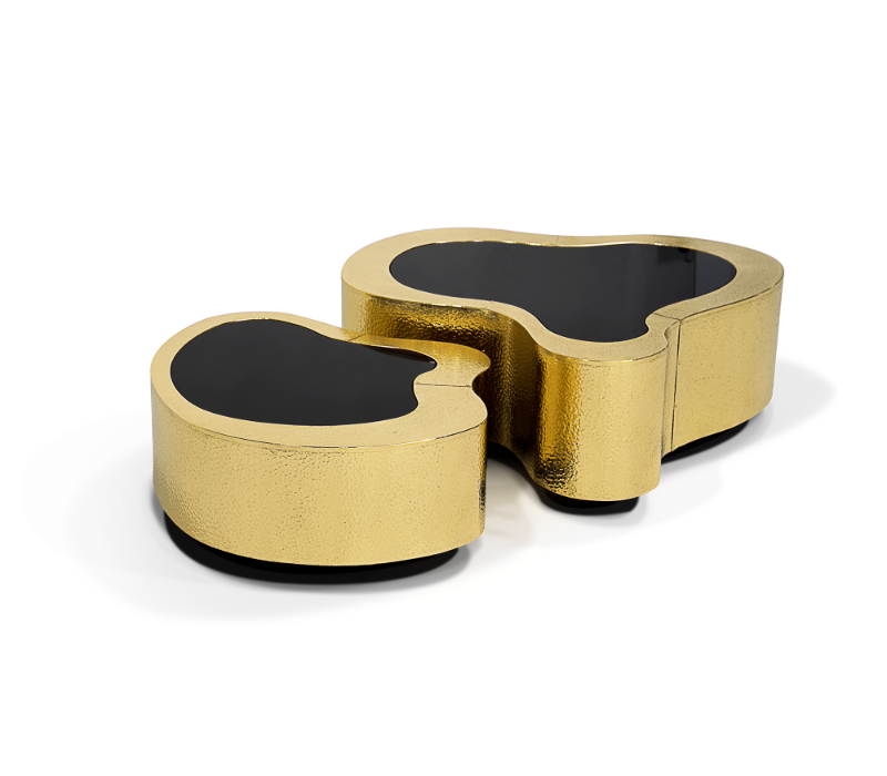 living room - two hammered gold center taibles with black glass