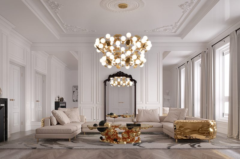 gold coffe table, nude sofa with gold details suspension lamp in gold and wooden mirror