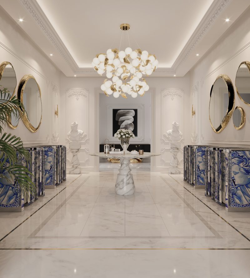 luxury entry way with marble pietra table on the sides the handpaited heritage sideboard, halor mirror with gold frame and era round suspension lamp