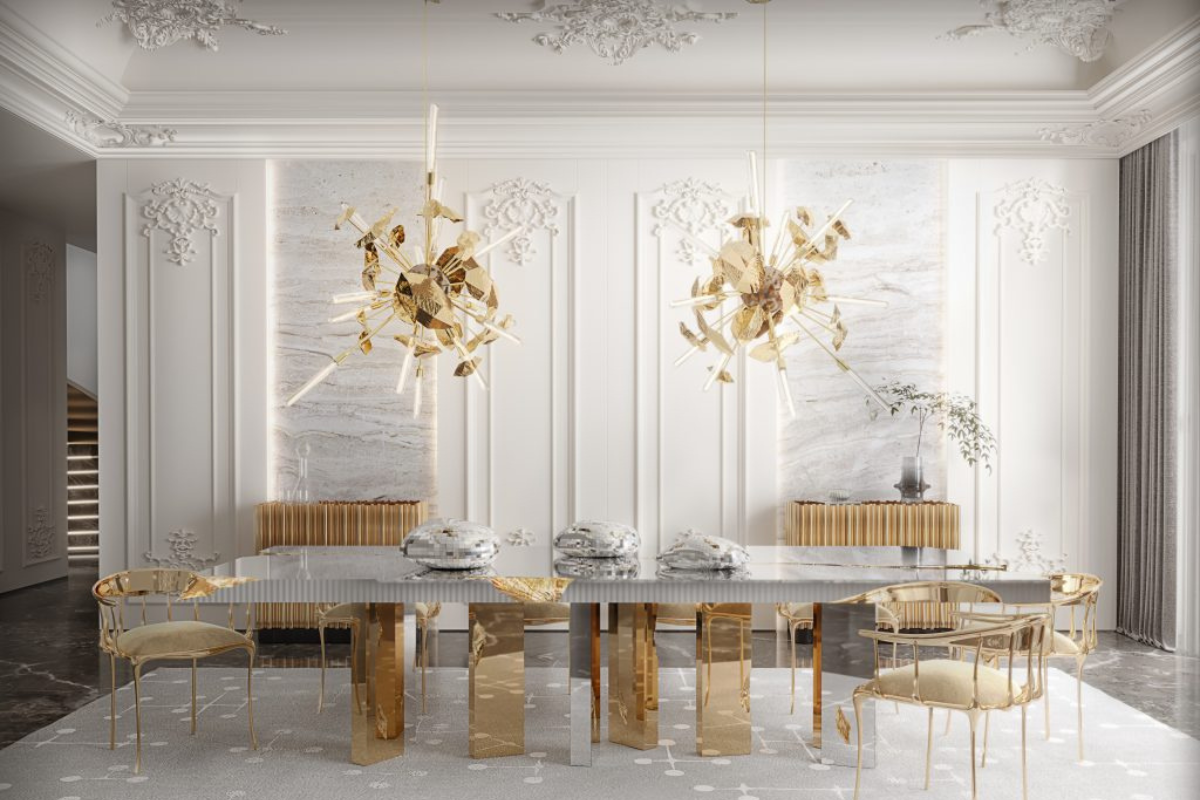 dining room with dining table in silver and gold and two suspenion lamps in gold