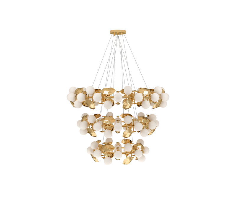 A modern lighting fixture is constructed with three tiers, with pendant lights hanging from a round brass structure. Bulbs in frosted glass.