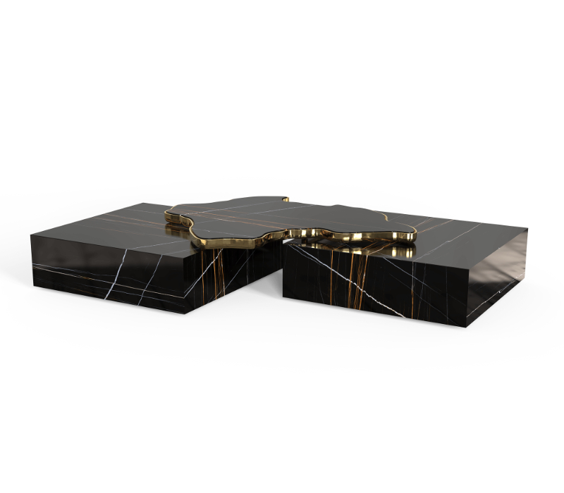 luxury living rooms - a contemporary center table composed by two square marble modules, linked by an organic marble surface element on top enveloped by casted brass