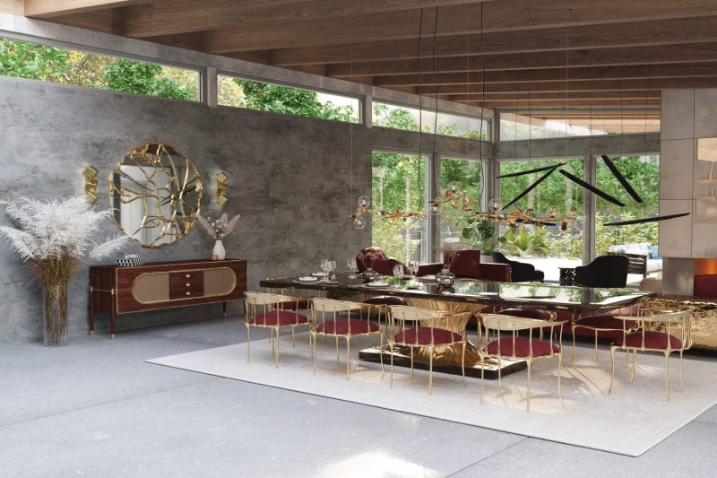 Los Angeles - contemporany dining room with a white rug, black and gold dining table, chairs with red and golden details, golden suspense lamp, mirror with gold details, plants and brown sideboard
