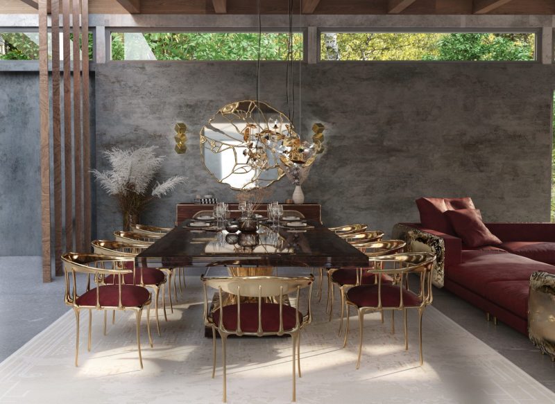 Los Angeles - contemporany dining room with red chairs with gold details, black and gold dining table, red sofa with gold details, white rug and a mirror with golden details