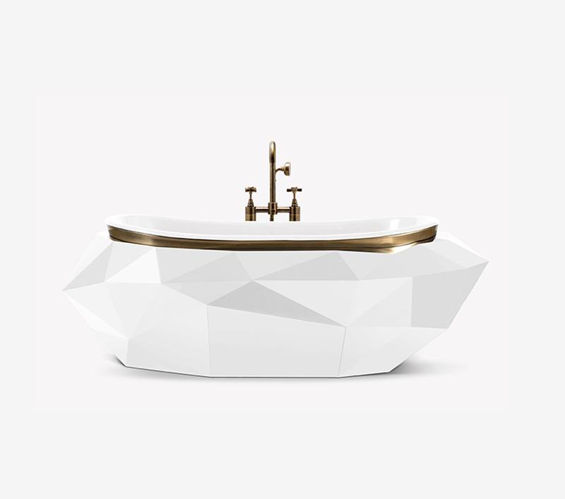 avenue interior design- white bathtub with gold accents