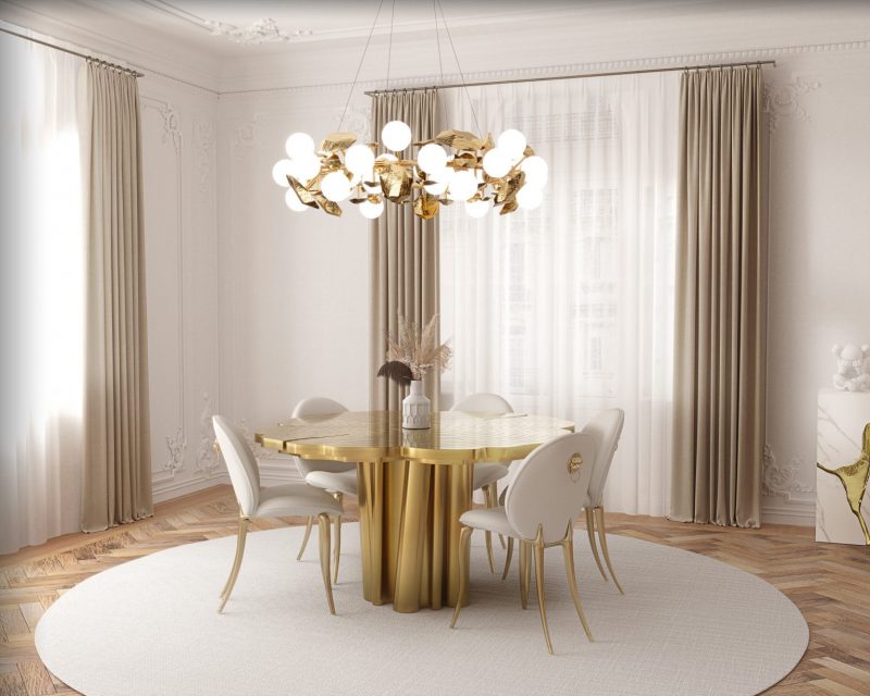 dining chairs- golden table, minimalist environment, white and gold dining chairs, golden lamp, white round casing, beige and white curtains, soleil